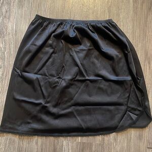 Vassarette black mini slip skirt